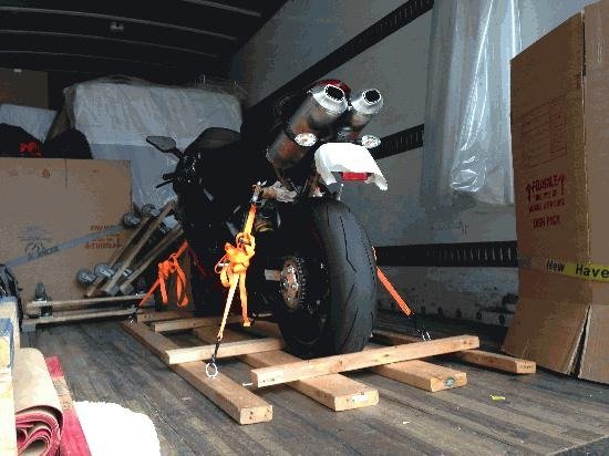 Loading a motorcycle for Bike Shipping Pune